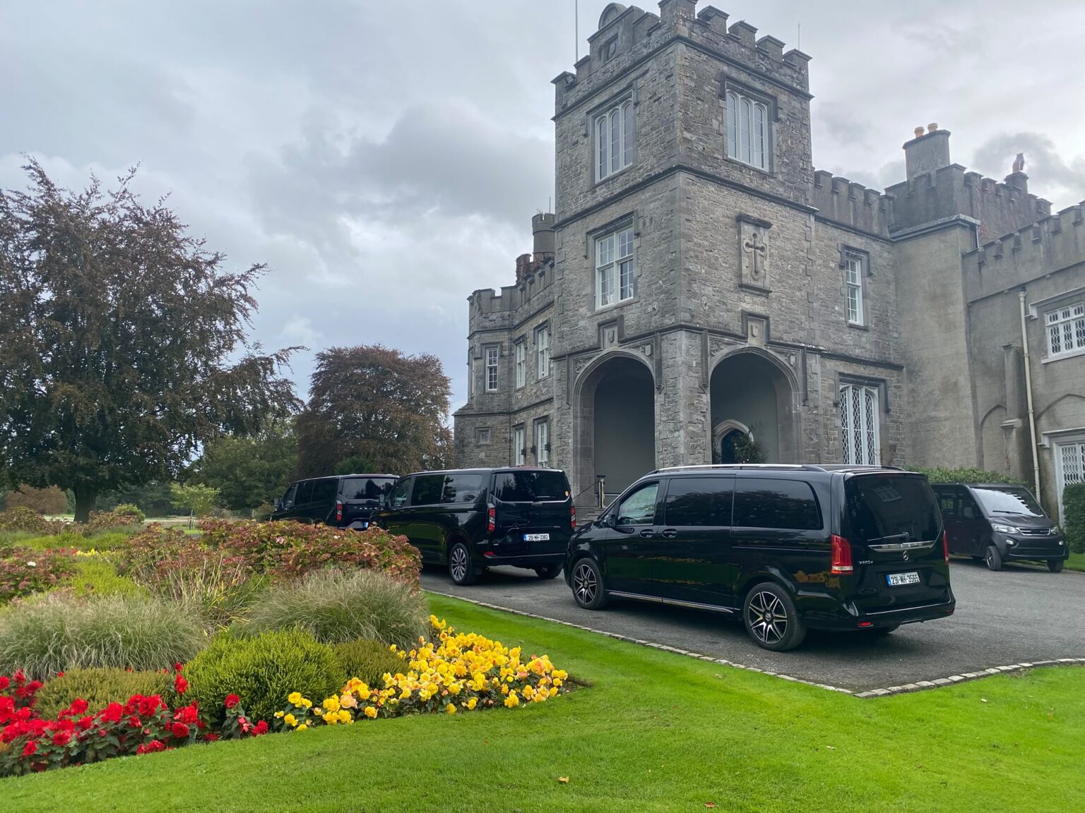 Lir Executive Chauffeur Service fleet of 7 seater MPVs outside Luttrellstown Castle, Co. Dublin